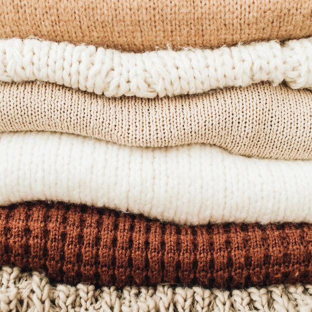 Closeup of warm winter sweaters and pullovers.