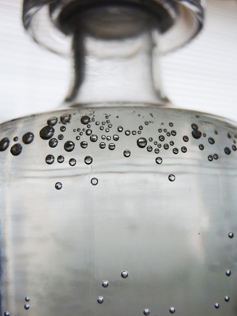 Closeup of water bubbles in a bottle