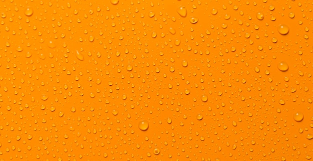 closeup water drop orange background