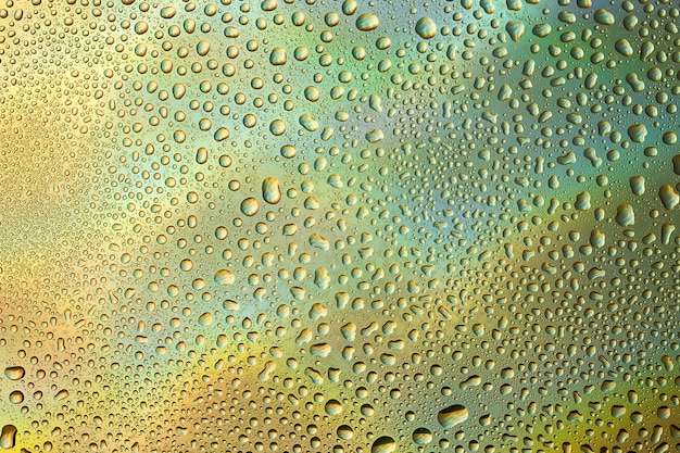 Closeup of water drops on glass surface