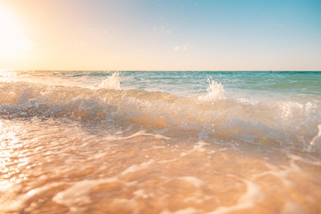 Closeup waves and sea sand paradise beach landscape. Inspire tropical beach blurred seascape horizon