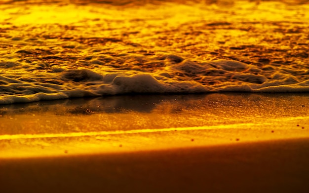 Closeup waves shot at sunset