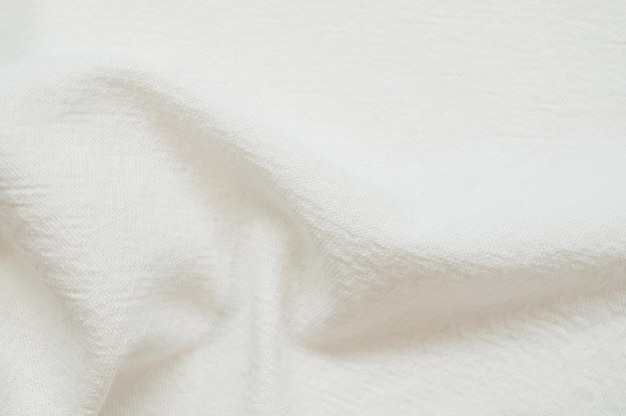Текстурированная ткань белого цвета крупным планом