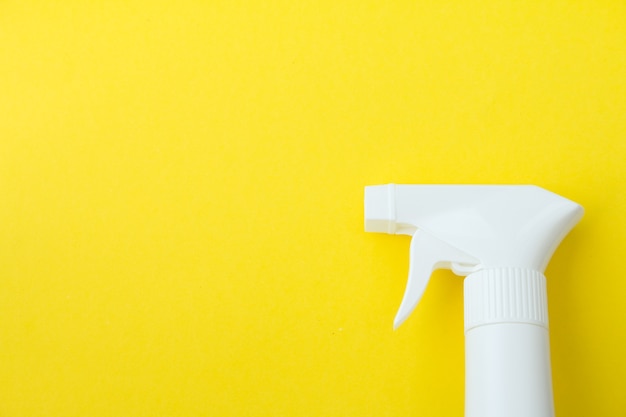 Photo closeup of white spray  bottle on yellow background set many copy space for put designer design concept