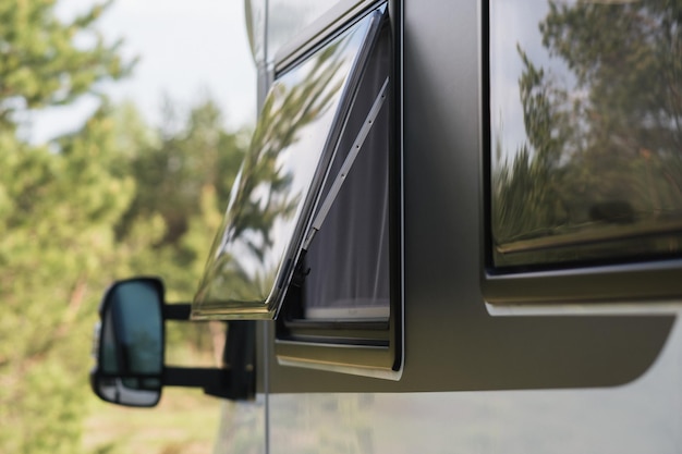 Closeup of a window in a motorhome rest in a van