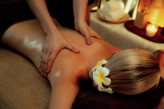 Closeup woman customer enjoying relaxing antistress massage Quiescent