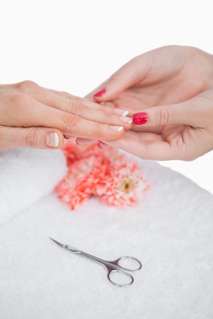 Closeup of woman getting manicure done