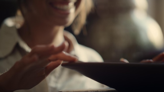 Closeup woman hands doing craft in studio Portrait of joyful artist making clay plate in pottery Smiling female ceramist enjoying pottery work in workshop Ceramic workshop result