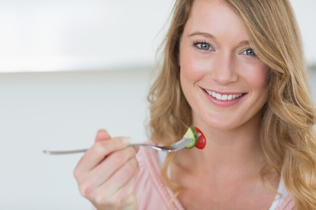 Closeup of woman having salad