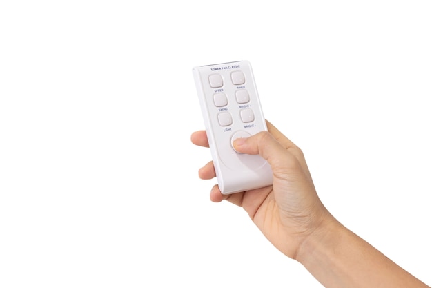 Closeup woman of right hand held use finger press button on white remote control isolated
