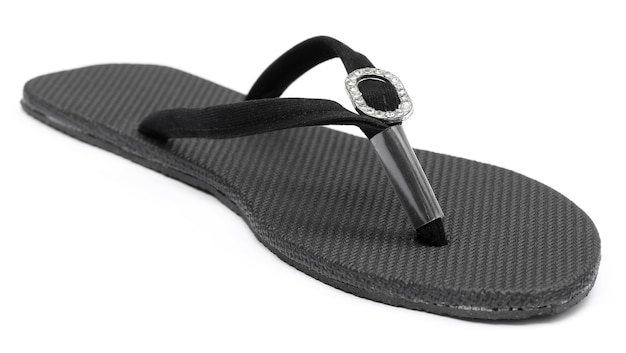 Closeup of woman sandal over white background