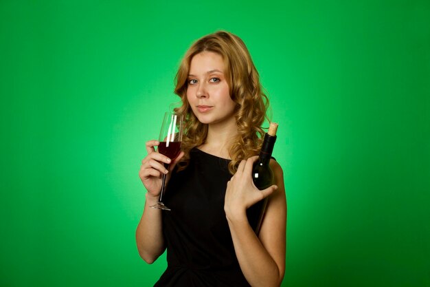 Closeup of woman with glass red wine