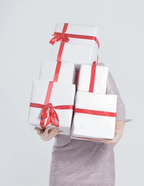 Closeup of woman with lots of gift boxes