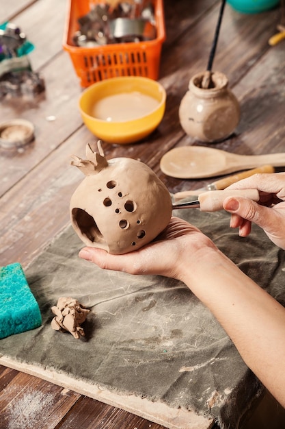 Closeup of women potter working