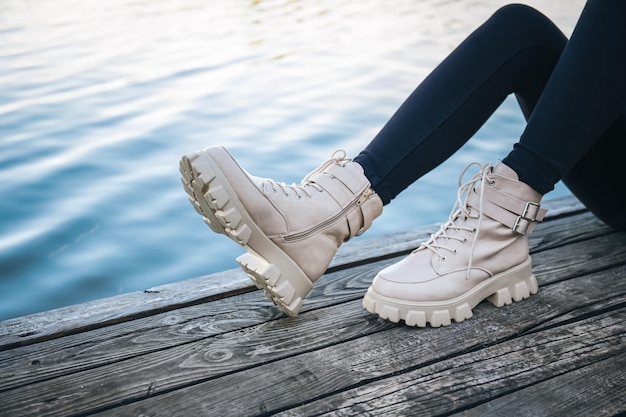 Closeup women39s shoes on the background of the river