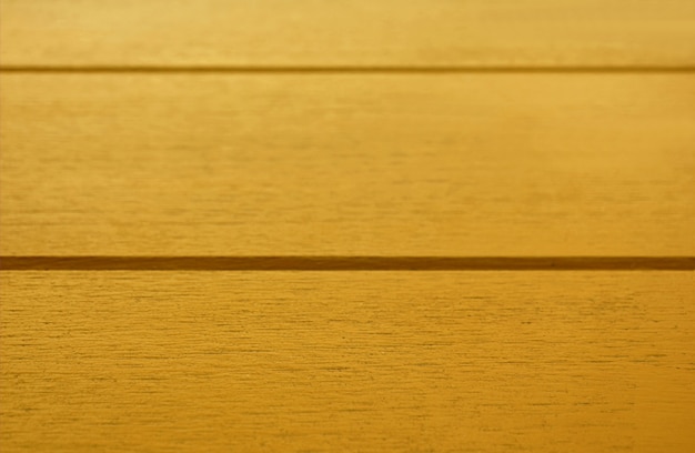 Closeup Yellow Colored Wooden Table Surface