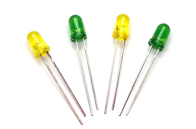 Closeup yellow and green LED diodes on a white background