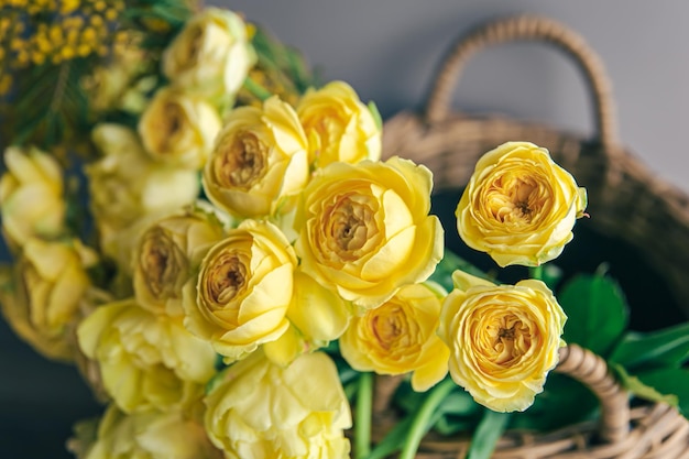 Closeup of yellow spring flowers in a basket