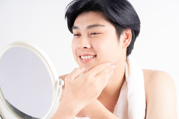 Closeup young asian handsome man face