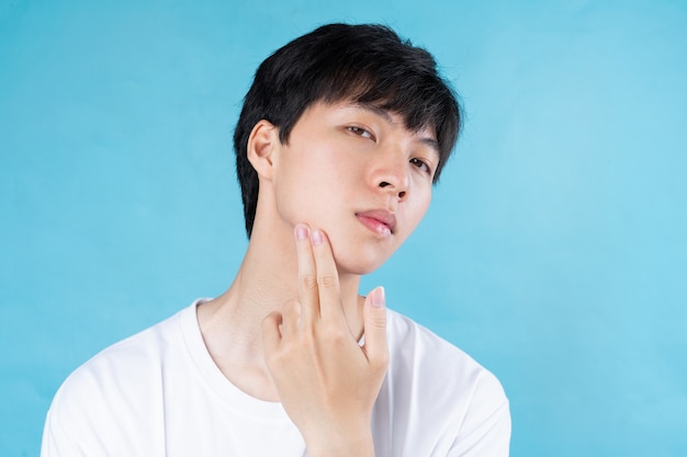 Closeup young asian handsome man face