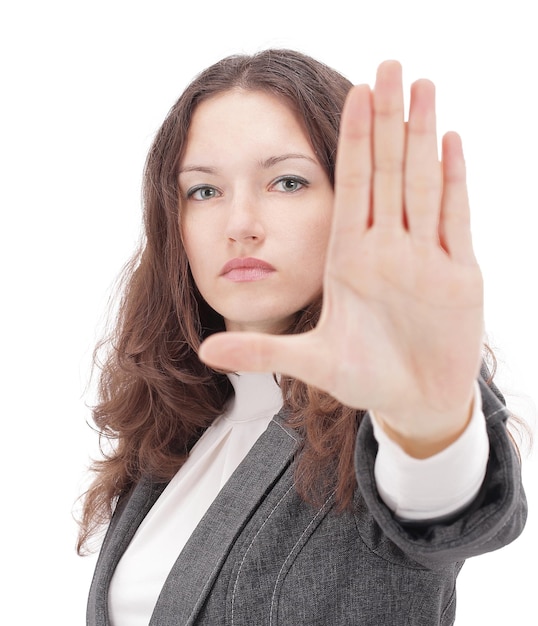 Closeupbusiness woman showing stop gestureisolated on a white