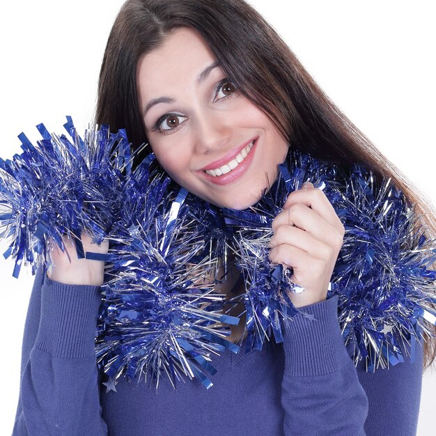 Closeuppretty girl with christmas tinsel isolated on white