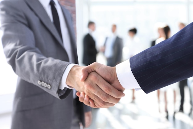Closeupreliable handshake of business partners
