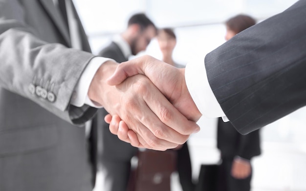 Closeupreliable handshake of business partners