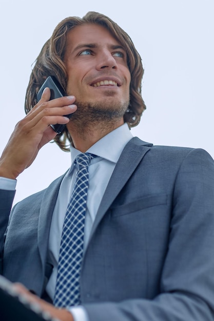 Closeupsuccessful businessman talking on the phone