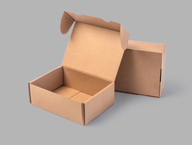 closing a stack of cardboard boxes on a grey background with clipping path