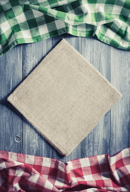 Photo cloth checked napkin on wooden background