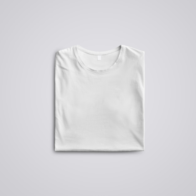 Cloth template.  Folded  blank T-shirt  with shadows  lying on the studio background. Top of view. Mockup ready to use in your design.