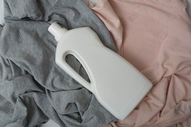 Photo clothes and bottle with detergent.