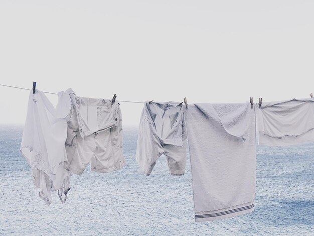 Photo clothes drying on clothesline against sky
