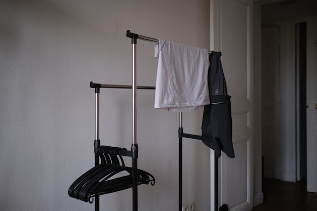 Photo clothes drying on clothesline against wall at home