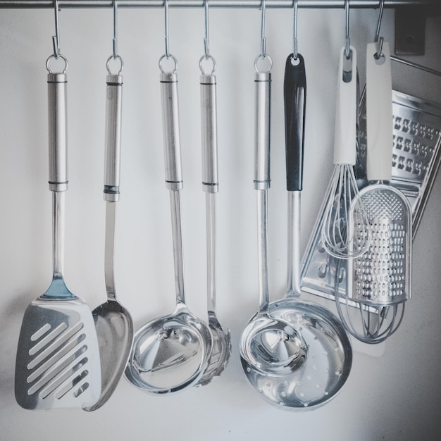 Photo clothes hanging on wall in kitchen