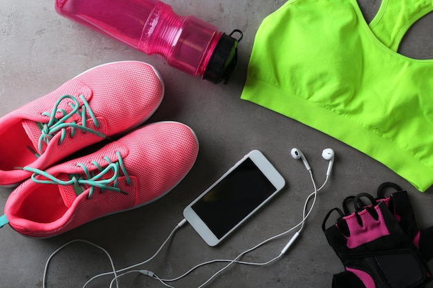 Clothes and items for sport on table