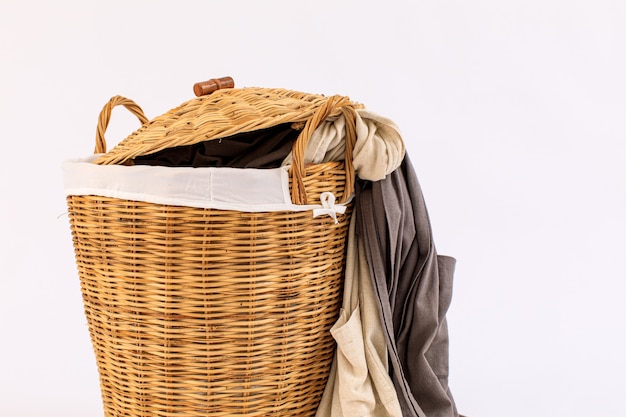 Clothes in a laundry basket isolated