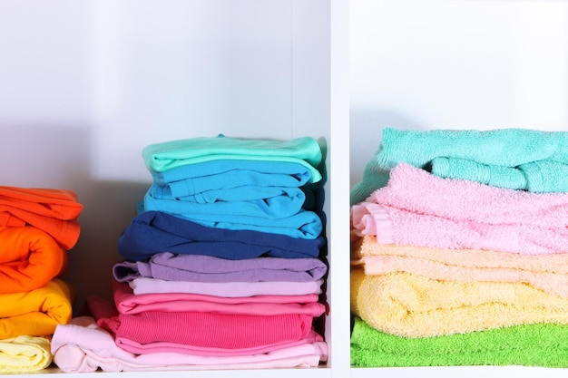 Clothes neatly folded on shelves