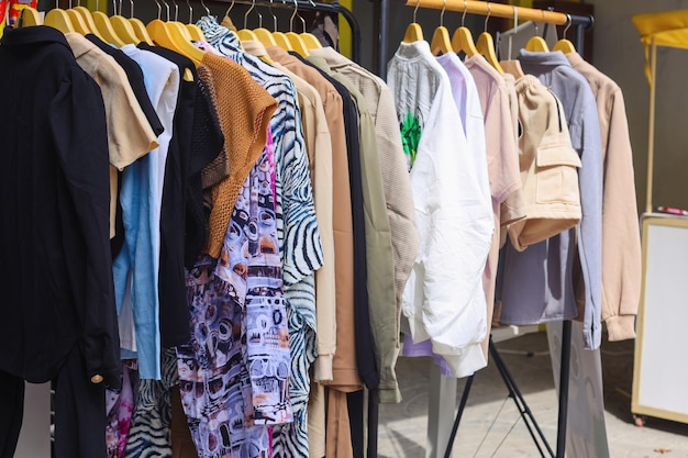 Clothes on a rack in a flea market