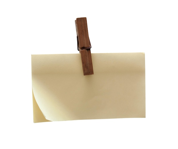 Clothespin holding blank post-it isolated