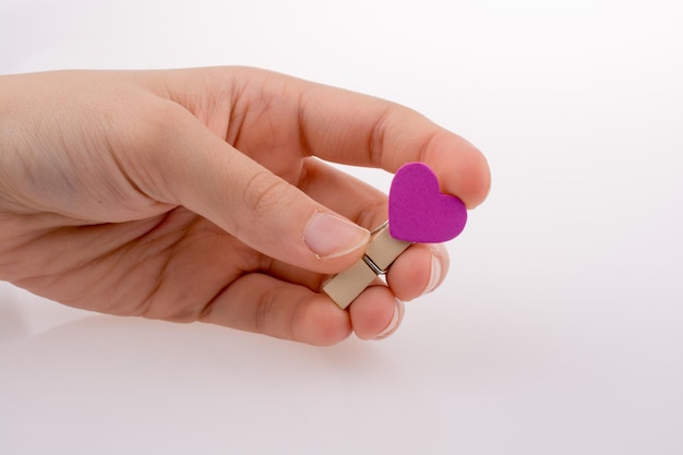 Clothespin with a heartshape in hand