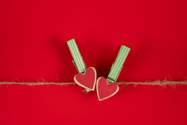 Clothespins with hearts on a rope