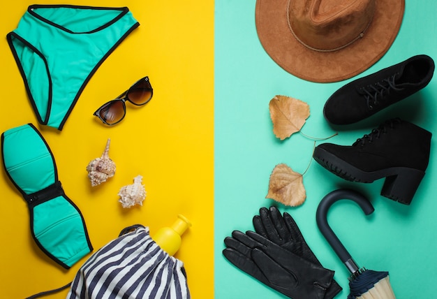 Одежда и аксессуары осенне-летний пляжный сезон на цветной бумаге поверхности.