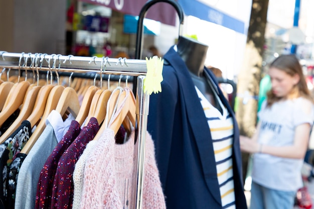 Clothing and accessories for sale at street market shop