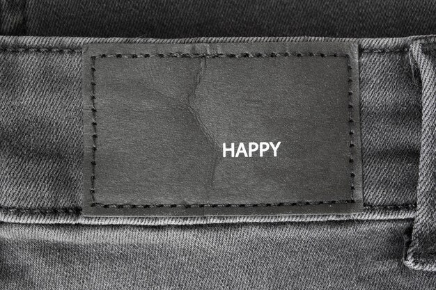 Clothing label says happy