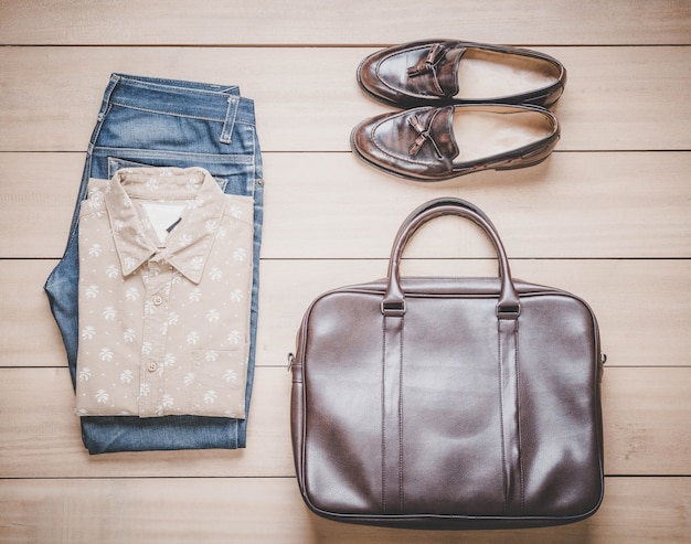 Clothing for men on the wooden background