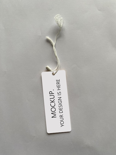 Photo a clothing tag on a white background layout for your design