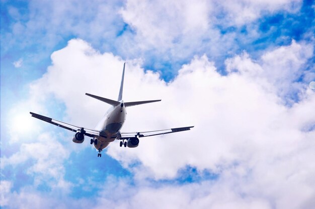 Cloud aircraft sky airplane vehicle focus flying above clouds day no humans scenery blue sky military signature