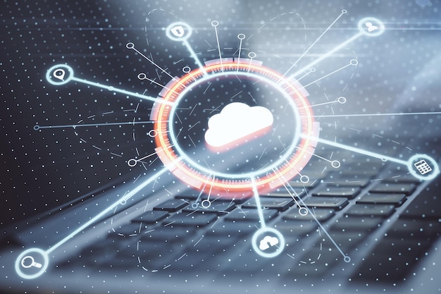 cloud computing service concept with digital cloud sign with internet service icons on laptop keyboard background double exposure